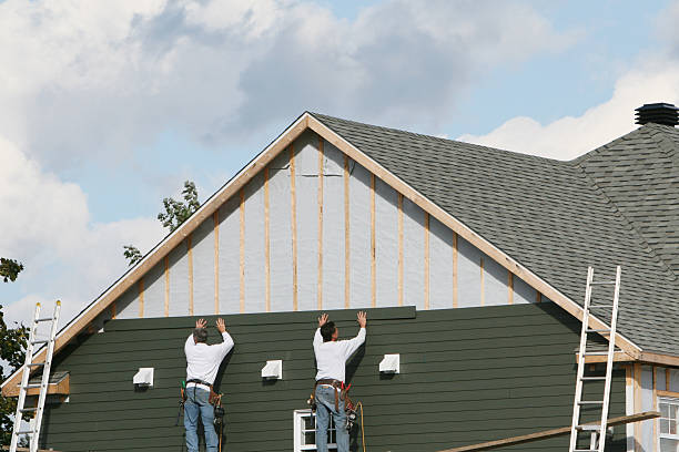Professional Siding Repair technician working in Hadley, PA